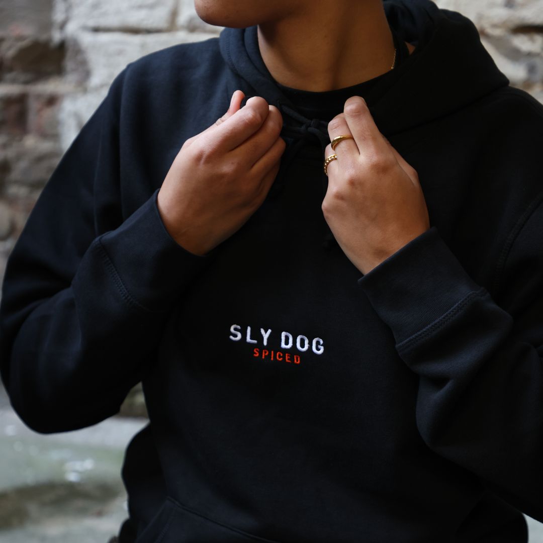 SLY DOG Hoodie – Front View of Model Wearing Bold Branded Hoodie